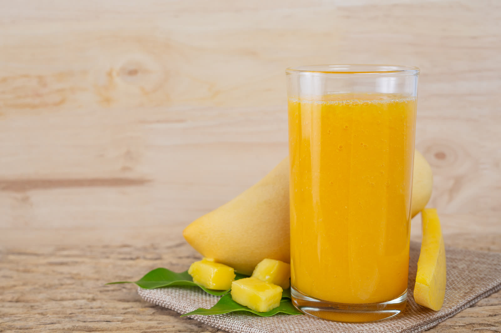 Mango juice on the wooden floor table