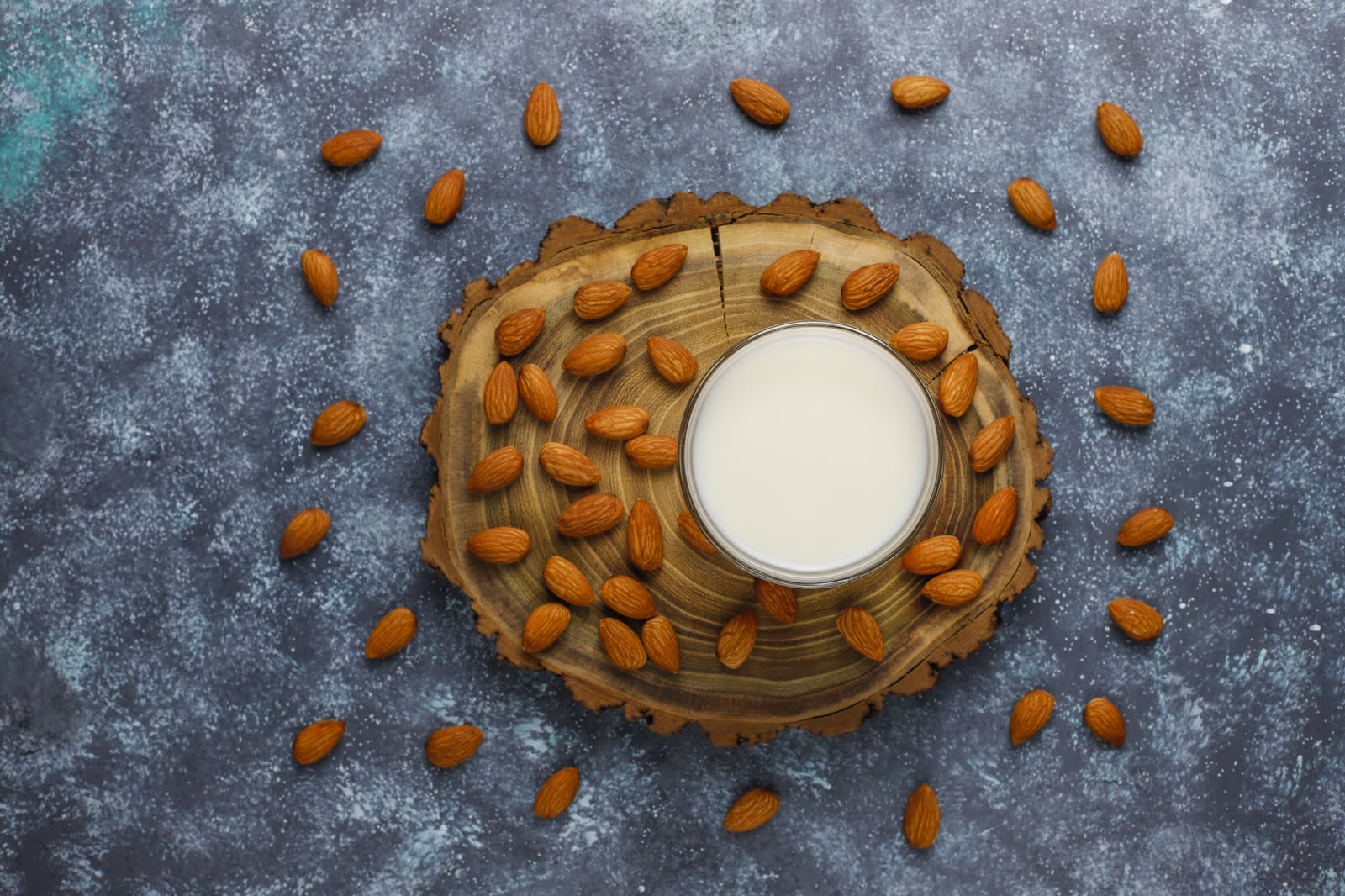 Almond milk with almond, top view